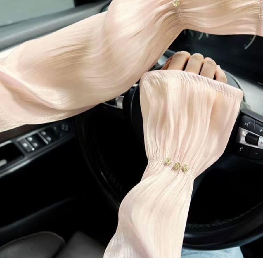 Beige sheer arm cover with pearl detail